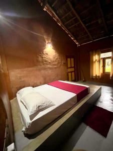 Postel nebo postele na pokoji v ubytování Bathle Eco Resort