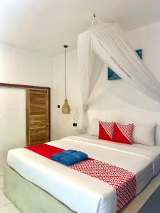 Ένα ή περισσότερα κρεβάτια σε δωμάτιο στο Sammy Homestay
