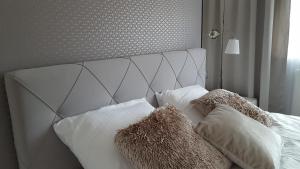 Posteľ alebo postele v izbe v ubytovaní Lake Apartment