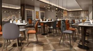 a dining room with tables and chairs in a restaurant at Metropolo Hotel Chengdu Wuhou Wanda Plaza in Chengdu +135 photos