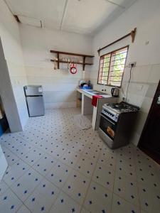 Η κουζίνα ή μικρή κουζίνα στο Guguski Homes