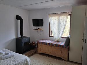 Postel nebo postele na pokoji v ubytování Family Country House