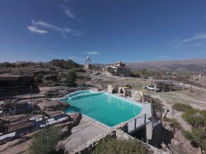 an overhead view of a swimming pool in the desert at Suite's on the rock's in Nono