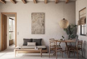 a living room with a couch and a table at Elion Villas in Kos Town