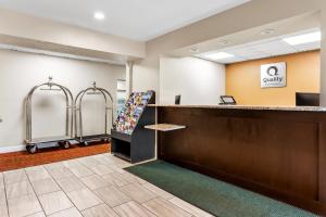 a waiting room at a quality hotel at Quality Inn in Sawyer +23 photos