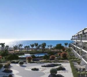 an aerial view of a resort with a swimming pool at New appartment with seaview in Almerimar