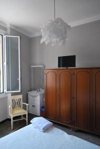 Postel nebo postele na pokoji v ubytování Albergo La Vela