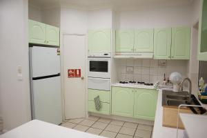 Kuchyň nebo kuchyňský kout v ubytování boutique single room + 14 fotografií