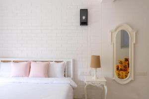 Ένα ή περισσότερα κρεβάτια σε δωμάτιο στο Cosmos Oasis by Da Alohas, Luxury 2BHK at Candolim