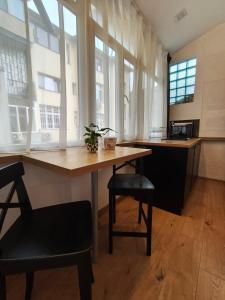 Kuchyň nebo kuchyňský kout v ubytování Stylish apartment, top center with private Sauna