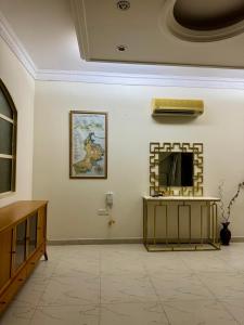 TV a/nebo společenská místnost v ubytování Beachside Room in Muscat