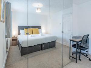 Ένα ή περισσότερα κρεβάτια σε δωμάτιο στο Pass the Keys Cosy home Basildon Ideal for contractors