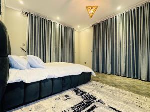 Postel nebo postele na pokoji v ubytování Bellwether Apartments + 28 fotografií
