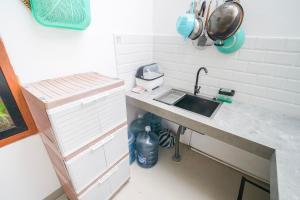 Kuchyň nebo kuchyňský kout v ubytování Villa Mulia Sedayu + 37 fotografií