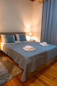 Ένα ή περισσότερα κρεβάτια σε δωμάτιο στο Το σπίτι στην Παλιά Ξάνθη