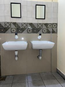 Ένα μπάνιο στο Suryagayathri Rest Home Kozhikode