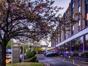 a parking lot in front of a building at Mercure Nottingham Sherwood in Nottingham