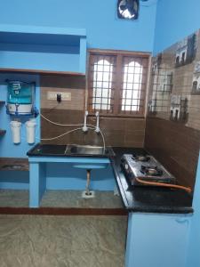 Η κουζίνα ή μικρή κουζίνα στο Jeremy Residency