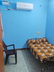 Ένα ή περισσότερα κρεβάτια σε δωμάτιο στο Jeremy Residency