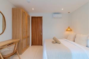 Ένα ή περισσότερα κρεβάτια σε δωμάτιο στο Villa Valli 4, Luxury Mediterranean Villa Bingin