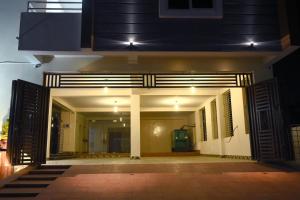 an entrance to a building with an open door at Stanza Premium Hotels in Bhubaneshwar