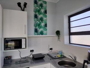 Dapur atau dapur kecil di Driftwoods +54 gambar