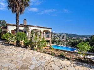 an image of a villa with a swimming pool at Villa Paradise in Calonge