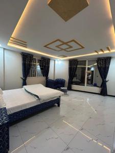 Ένα ή περισσότερα κρεβάτια σε δωμάτιο στο askari lodges