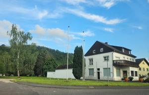 a white house on the side of a road at Ruheoase in Konz-Könen in Konz