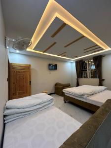 Ένα ή περισσότερα κρεβάτια σε δωμάτιο στο askari lodges