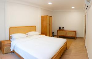 Postel nebo postele na pokoji v ubytování Oya Maldives Himmafushi + 2 fotografie