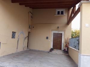 a side view of a house with a door at Dimora Visconti in San Demetrio neʼ Vestini