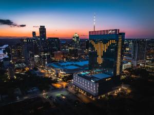 a view of a city skyline at night at Fairmont Austin in Austin