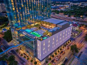 an overhead view of a building with a pool at Fairmont Austin in Austin