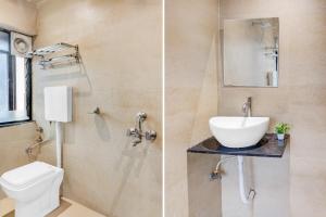 un baño con lavabo e inodoro en Collection O Viman Nagar Downtown Formerly Hotel Cilantro, en Pune