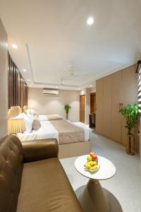 Giường trong phòng chung tại Hotel Deluxe Stay Inn Delhi Airport