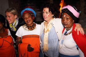 a group of women posing for a picture at a party at The Backpack Shack in Mossel Bay