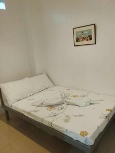 Postel nebo postele na pokoji v ubytování Z and J Transient House l- CDO