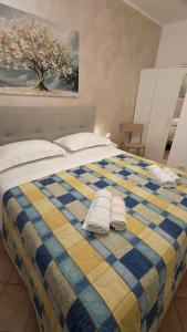 Ένα ή περισσότερα κρεβάτια σε δωμάτιο στο L' albero di Giada