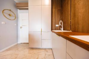 Kuchyň nebo kuchyňský kout v ubytování OLSZYNKI PARK 2- High-End Luxury Apartment with View, City Centre by StayNest + 26 fotografií