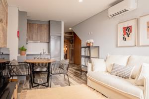 a living room with a couch and a table at LR Vintage 96 in Vila Real