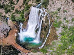 an aerial view of a waterfall on a mountain at Apartment in Knin near Knin Fortress in Knin +32 photos