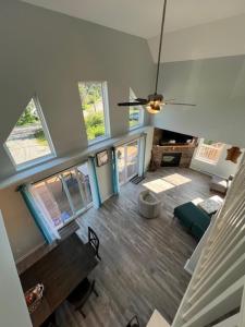 an overhead view of a living room with a ceiling at Chalet Montelago in The Hideout in Lake Ariel +51 photos
