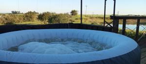 a large tub filled with snow on a deck at Casa Campo in Cufré