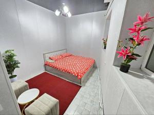 Ένα ή περισσότερα κρεβάτια σε δωμάτιο στο Comfortable Apartments