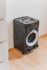 a stove with a toilet in the corner of a room at Central Cosy Stylish Apartment in Vienna