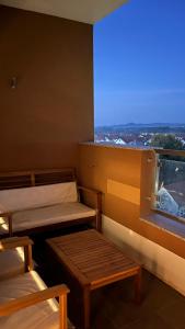 a room with two bunk beds and a window at DreamerLux in Loznica