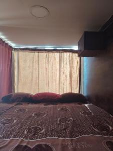Ένα ή περισσότερα κρεβάτια σε δωμάτιο στο Petra Bed Hostel