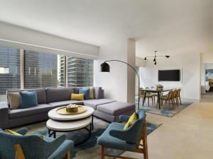 a living room with a couch and a table at Swissotel Chicago in Chicago