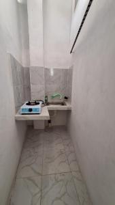 Koupelna v ubytování First Guest House Syariah